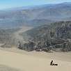 Descendemos la duna en sandboarding / Ruta a pie Cerro Blanco 